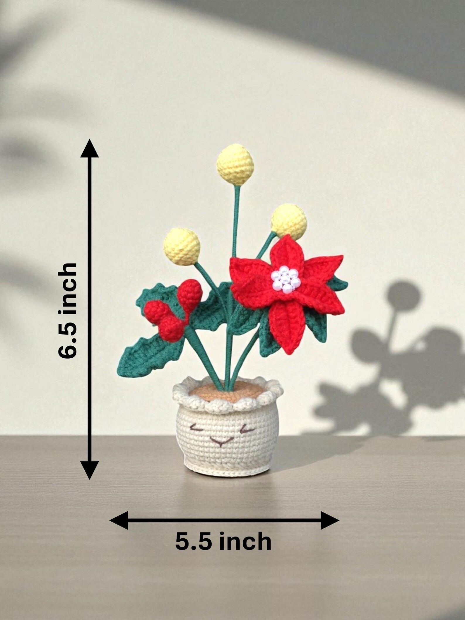 Gehäkelte Blume im Topf Weihnachtsstern