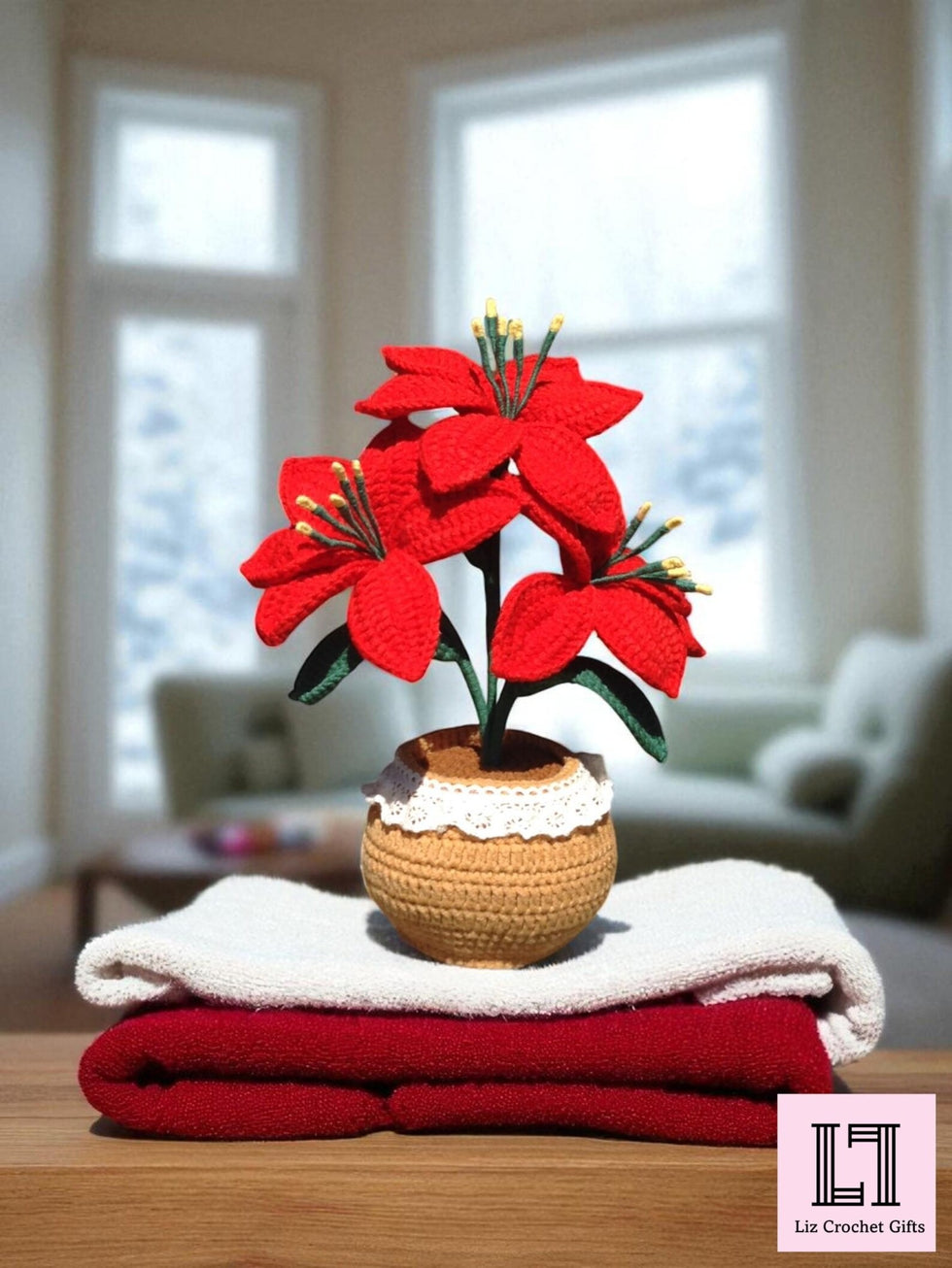 Gehäkelte Blume im Topf Weihnachtsstern